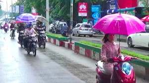 Motorbikes in the rain Myitkyina